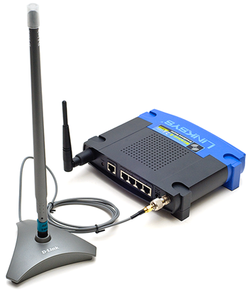 A D-Link Antenna plugged into a Linksys wireless router to increase wireless range